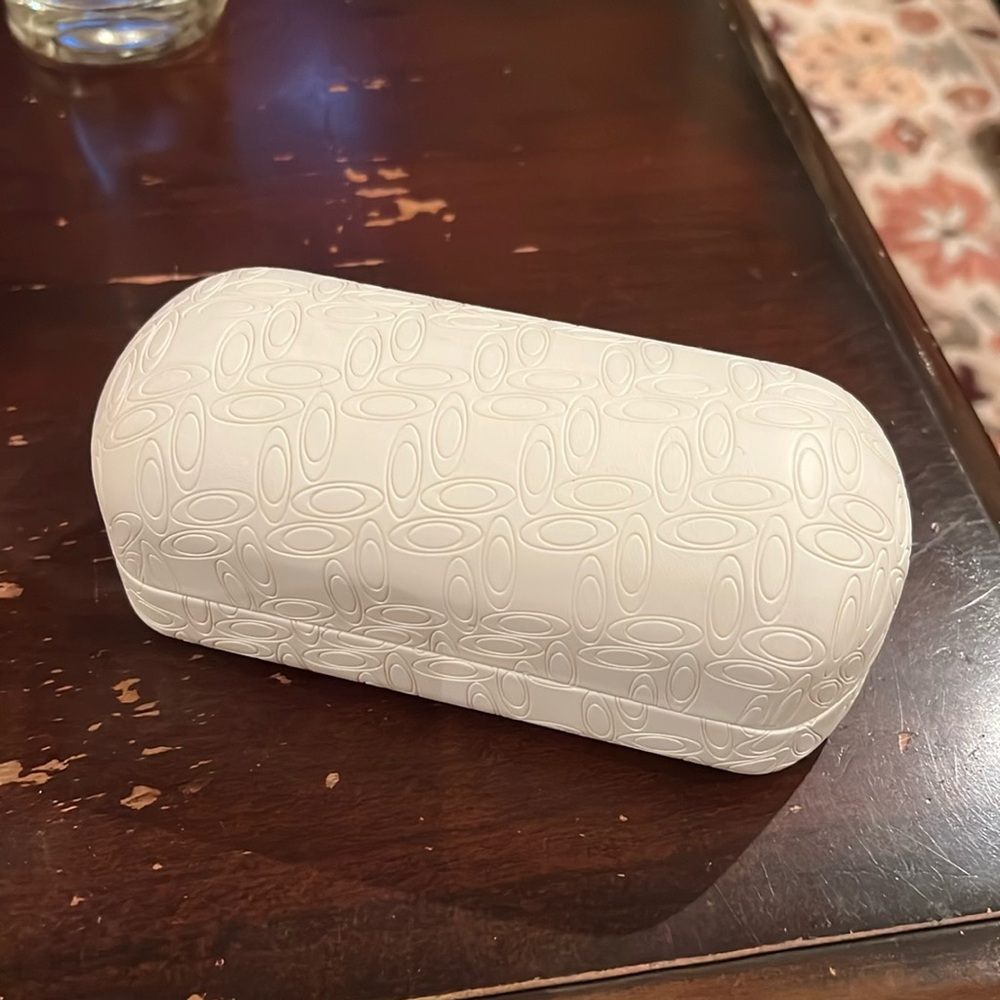 Oakley white hard case.